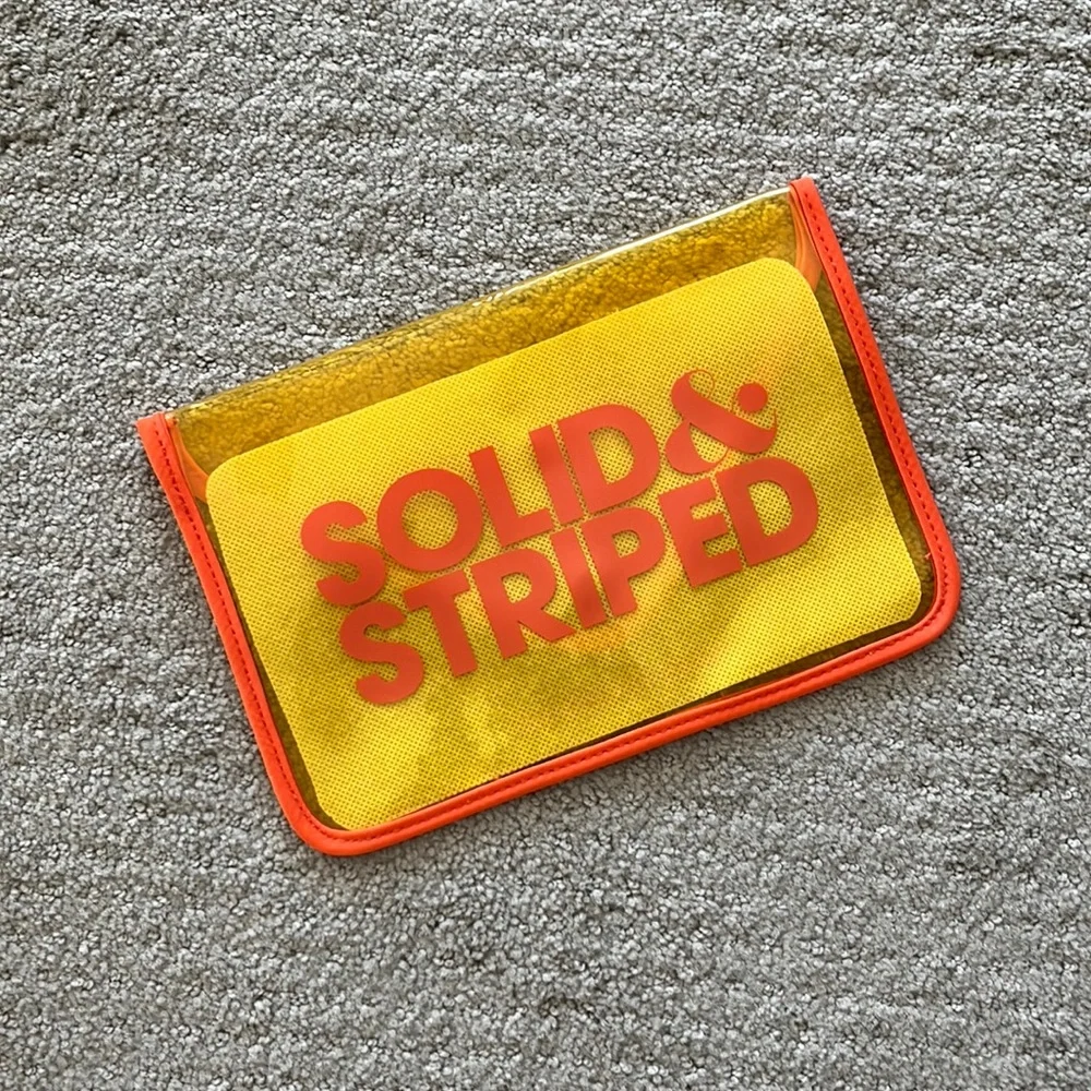 5/$25- Solid & striped wet/cosmetic bag